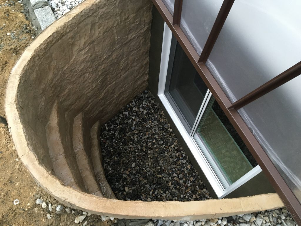 Stone Stacked Well in Egress